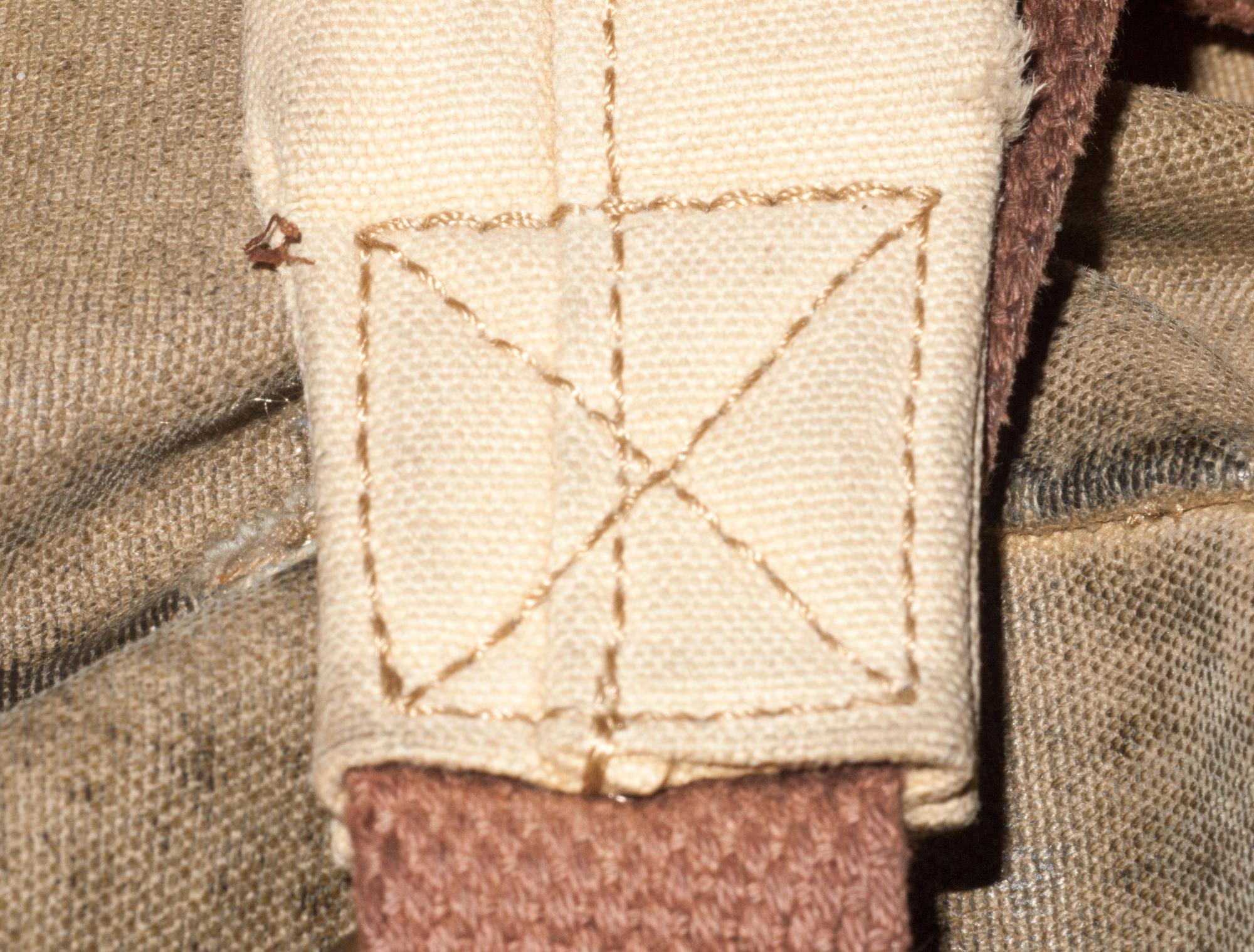 Small sample: geometric stitch on linen